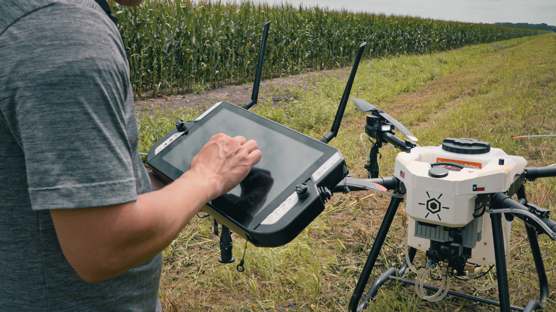 Operator flying a drone with compliance documentation
