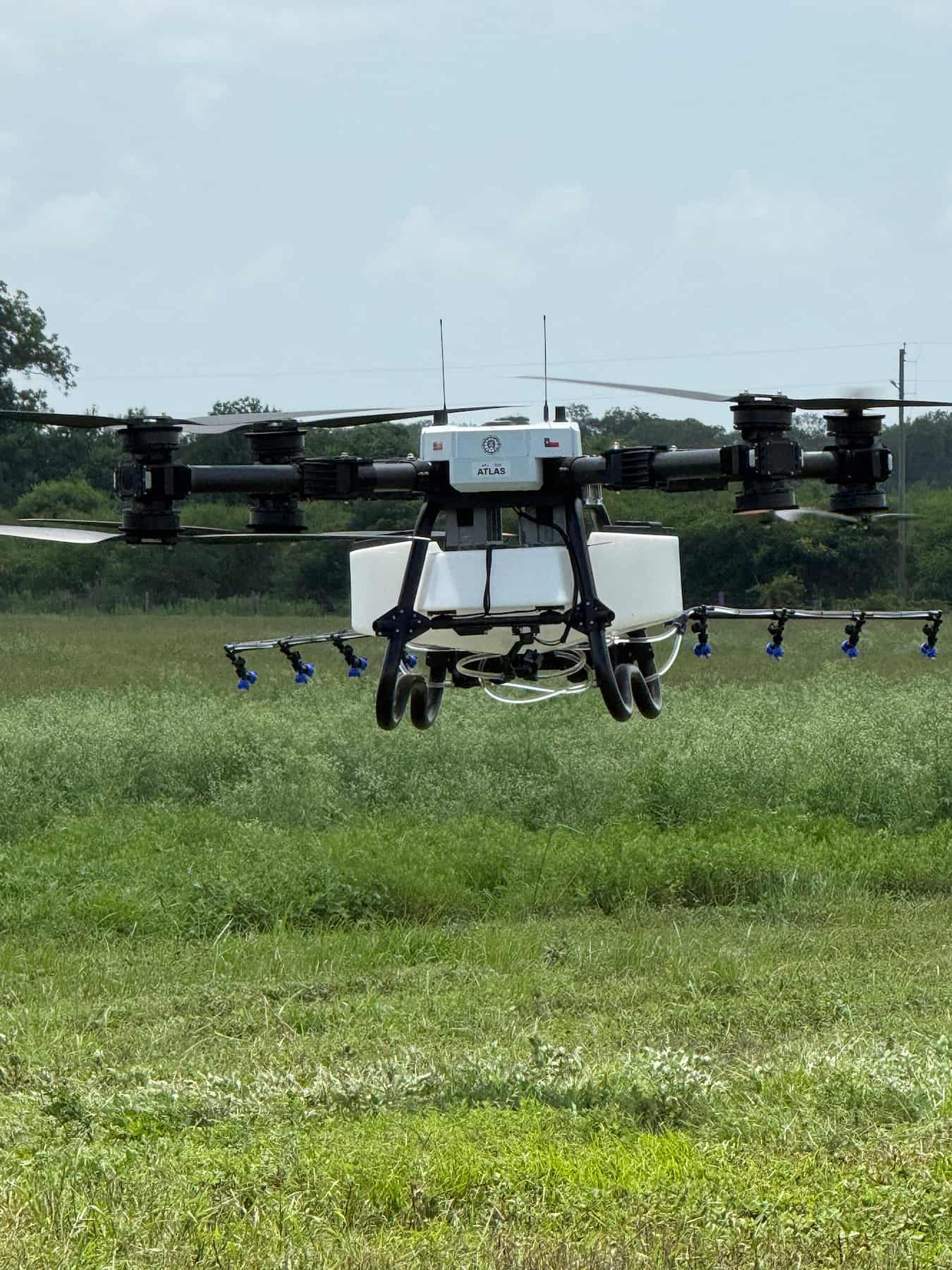 Technician servicing a drone to reduce downtime